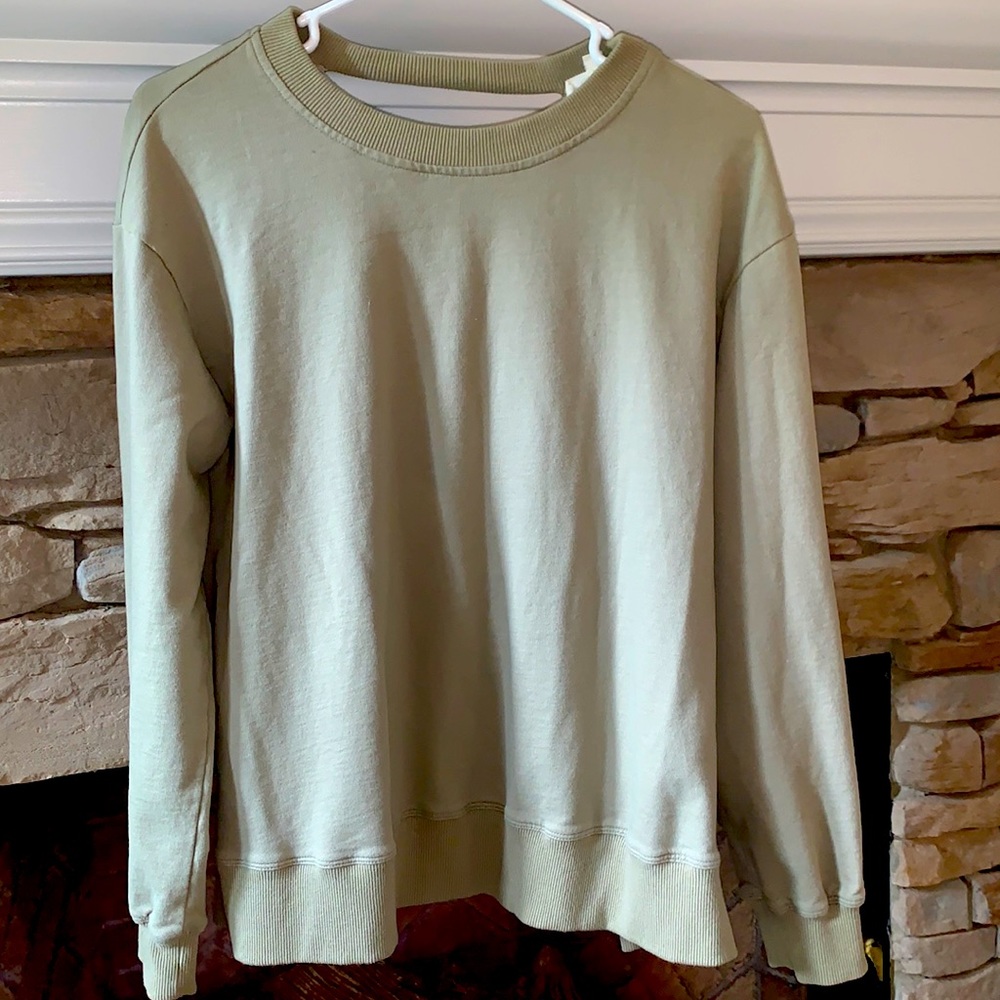 Forest green sweatshirt from a boutique